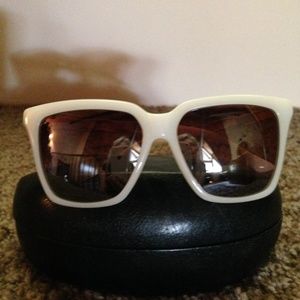 White framed sunglasses with black crystal on arms